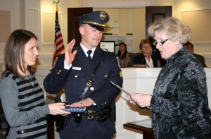Patrol Sergeant Michael Workman is sworn in by Borough Clerk Suzanne Stanford